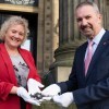 Michael Conlon, Chairman of Conlon Construction handing over The Harris ceremonial key to Councillor Anna Hindle, Cabinet Member for Culture and Arts at Preston City Council