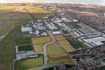 Aerial image of the new road and plots