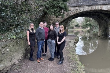 Chris Brown and Lydia Read-Potter, centre front, with the team from BookSmart Accounting