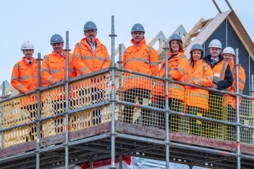 Paul Foster MP And Aniela Bylinski Gelder with the Barratt Homes Team