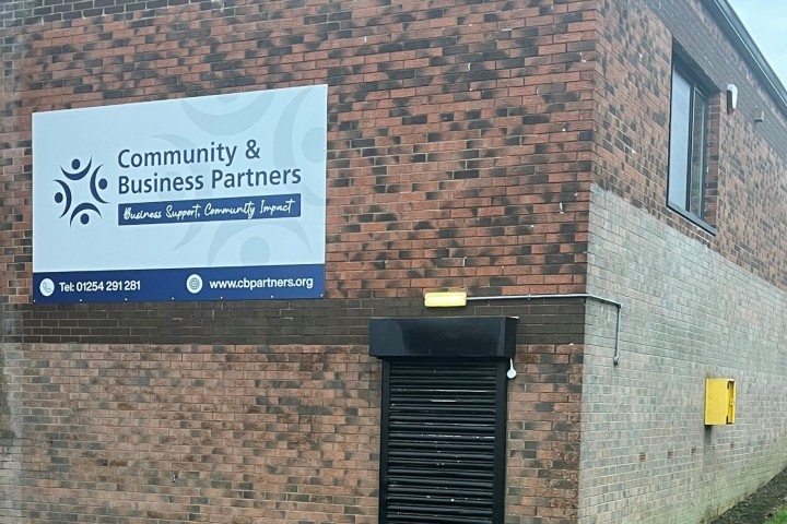 Community and Business Partners in Blackburn with doors shut