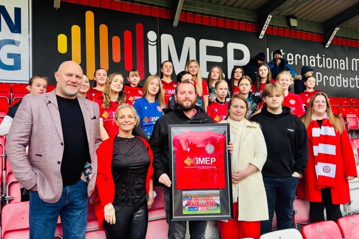 Accrington Stanley Women presented sponsors iMEP with a framed shirt.jpg.jpg