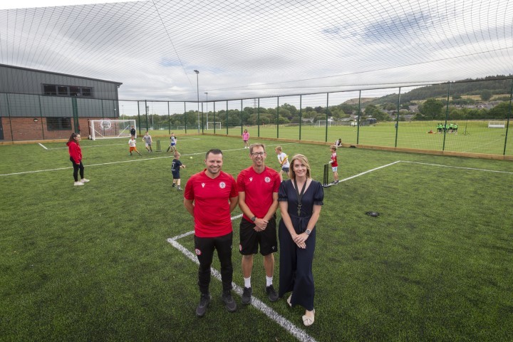 Members of the Accrington Stanley Community Trust team on the brand new 3G pitch at the Stanley Sports Hub.jpg.jpg