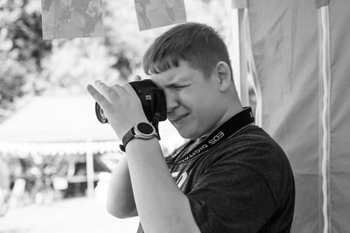 Jack capturing the atmosphere at the E2M 2022 Green Festival as one of the official photographers